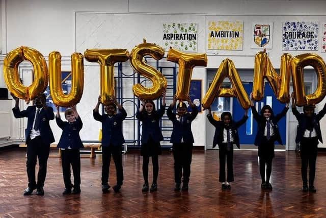 Pupils celebrate their recent Ofsted grading