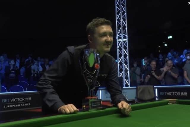 Kyren Wilson poses with the trophy after winning the BetVictor European Masters