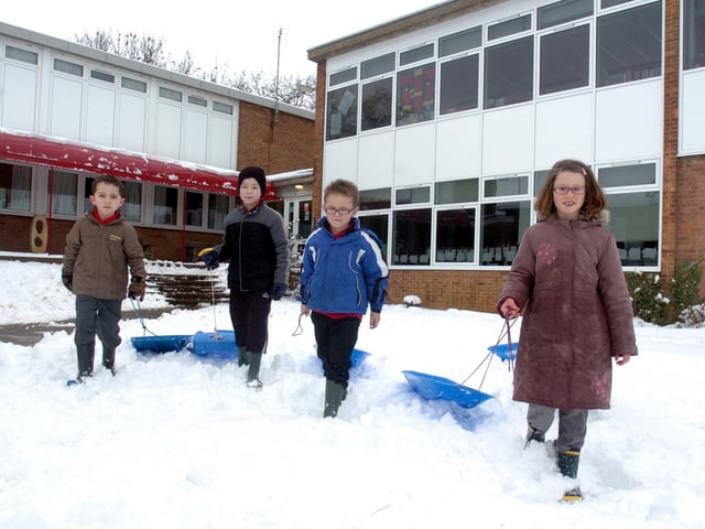 Making it to school despite the snow in February 2009 - Kieran Farrel, five, brother Aidan, eight, Emilia Beradi-Ross, eight, and Harry Blumire, six