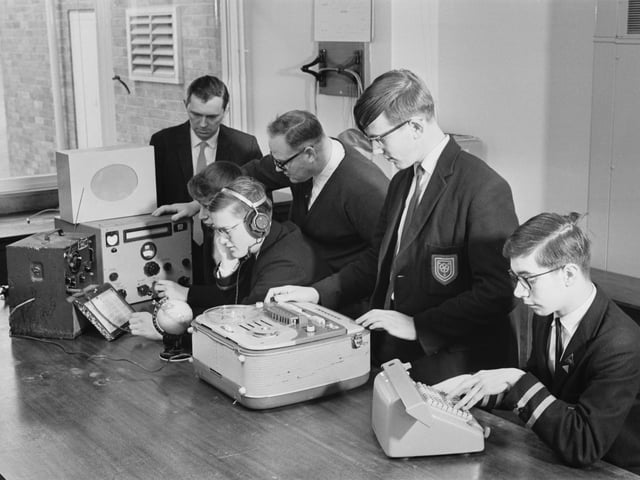 Some of the pupils at Kettering Grammar School in Northamptonshire, who have been tracking Russian satellites using old Government equipment, 21st December 1966. They are chemistry teacher Derek Slater, physics teacher Geoffrey Perry, and pupils Graham Coleman, Philip Gregory, Robert Christy and Richard Jahn. (Photo by Peter Dunne/Express/Hulton Archive/Getty Images)