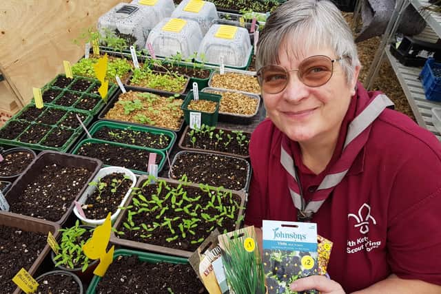Vicky Geary in her greenhouse has been busy preparing for this year's plant sale/Geary family