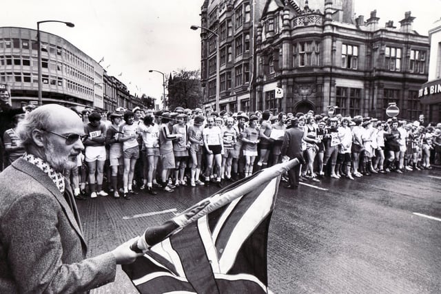 Colin Brannigan, the editor of The Star, flagging off the 1977 Jubilee Star Walk in High Street, Sheffield on 7 June, 1977, held to mark the Queen's Silver Jubilee