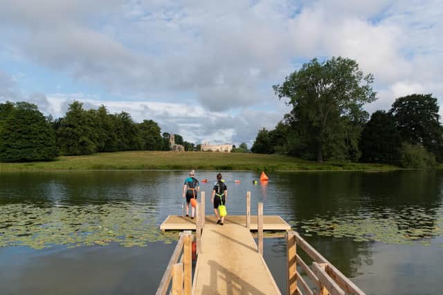 Open water swimming at The Falcon Hotel, Castle Ashby.