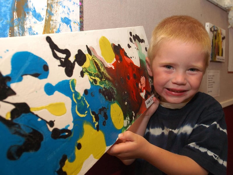 Aidan Sumner, 3, with his work of art for an exhibition back in 2006