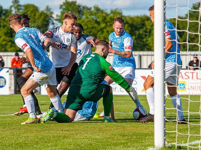 Goalmouth action from Corby Town's 2-0 home defeat to Loughborough Dynamo. Pictures by Jim Darrah