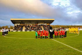 Steel Park fell silent ahead of last weekend's derby clash with Harborough Town as Corby Town honoured the memory of long-serving secretary and president Gerry Lucas. Picture by Jim Darrah