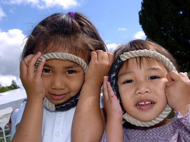 Fun at the 2008 school fete for sisters Ayiana Maitim, four, and Ashleigh Maitim, two