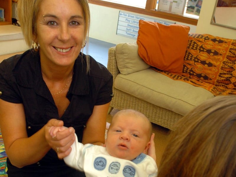 Suzanne Robertson, post-natal depression specialist, with a mum at Pen Green in 2006.