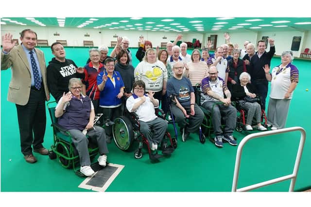 MPs Philip Hollobone (on far left) and Tom Pursglove (second from right) with members of The Crusaders section at Desborough Indoor Bowling Club/Desborough Indoor Bowling Club