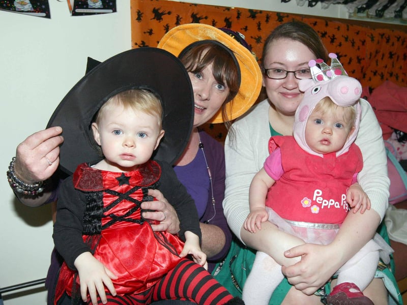 Pictured are 16-month-old Maisey Miller with her auntie, and creche worker, Fiona Carroll, and 13-month-old Evie Fleming with her mummy Cherisse, a centre volunteer.