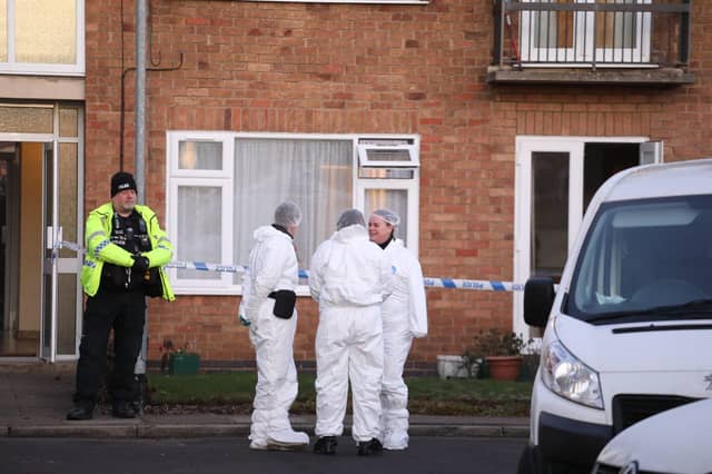 Officers at the murder scene