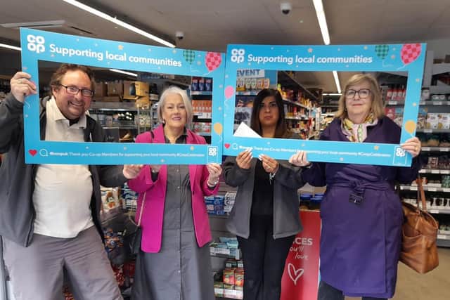 l/r Johnathan Hornett Co-op members pioneer Liz Barnatt Jug Hobbs Co-op Manager Carol Fitzgerald