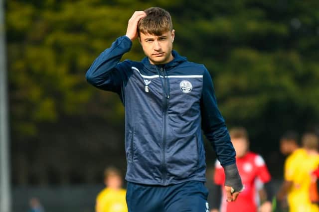 The reaction of captain Alex Collard, who missed out through injury, tells the story after AFC Rushden & Diamonds missed out on a play-off place. Pictures courtesy of Hawkins Images
