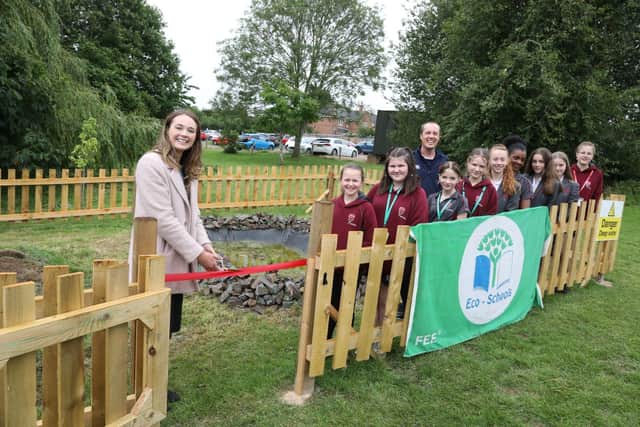 Mayor of Kettering Cllr Emily Fedorowycz cuts the ribbon on the wildlife area
