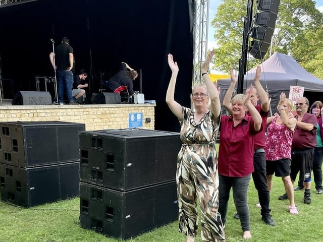 Crowds resist the rain and descend on Hall Park to enjoy the day.