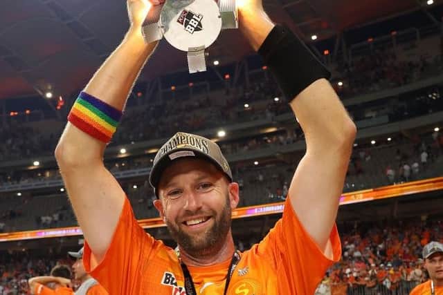 AJ Tye celebrates his Big Bash League win with the Scorchers in February