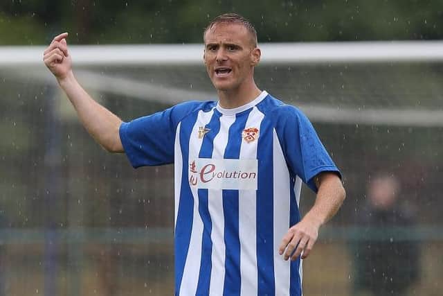 Brett Solkhon has signed a new deal to stay at Wellingborough Town