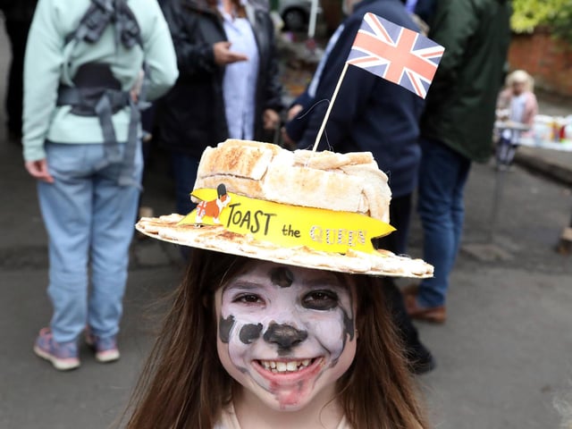 Wellingborough, Castle Street party - Lola Jones, 8, toast for the Queen hat