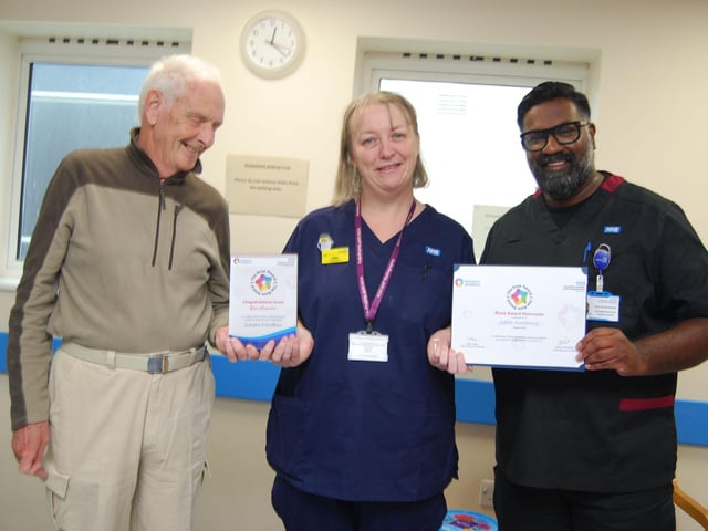 Diagnostic Radiographer Jude Armstrong receives her award with nominator John Bosworth and Prof Ganesh Baliah