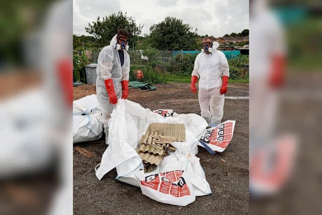 Peter New and Andrew Redden remove the asbestos from the Margaret Road allotments in Kettering/Kettering Town Council