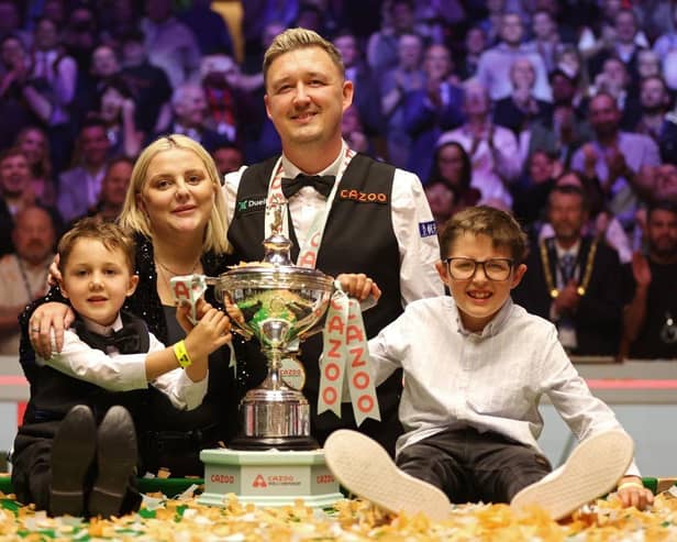 Kyren Wilson poses with his wife Sophie Lauren alongside his two young sons after winning the Cazoo World Snooker Championships