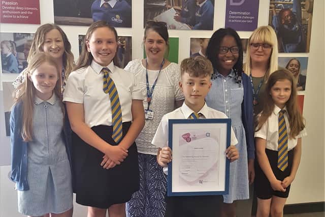 Staff and pupils with the Emotional Wellbeing and Mental Health award.