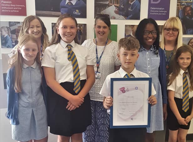 Staff and pupils with the Emotional Wellbeing and Mental Health award.