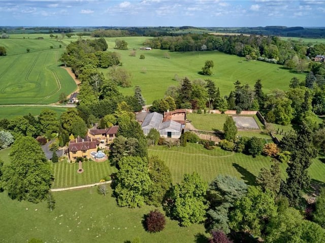 The home has traditional features as well as an indoor swimming pool, equestrian facilities and extensive parkland.