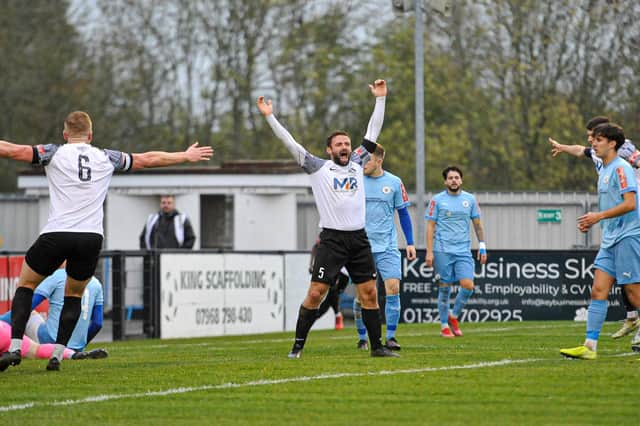 Dan Gordon celebrates after he gave Corby Town the lead in their 2-2 draw with Sporting Khalsa at Steel Park. Pictures by Jim Darrah