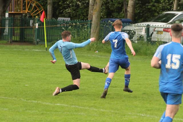 Jack Wisniewski scores one of his three goals in Nomads' win at Wollaston