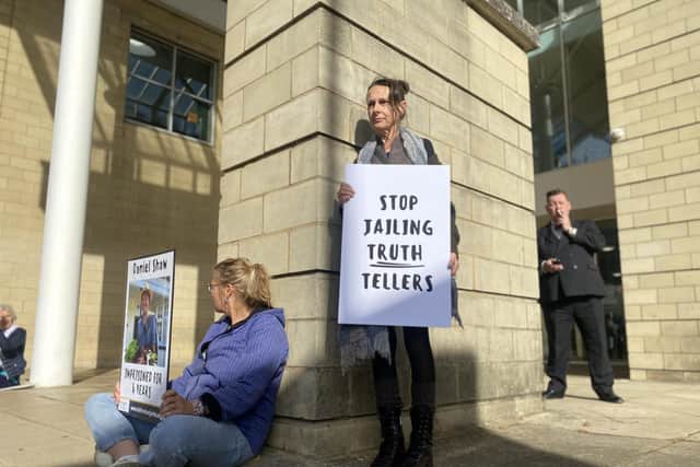 Protestors have gathered outside Northampton Crown Court. Photo: 1000 Voices Northampton.