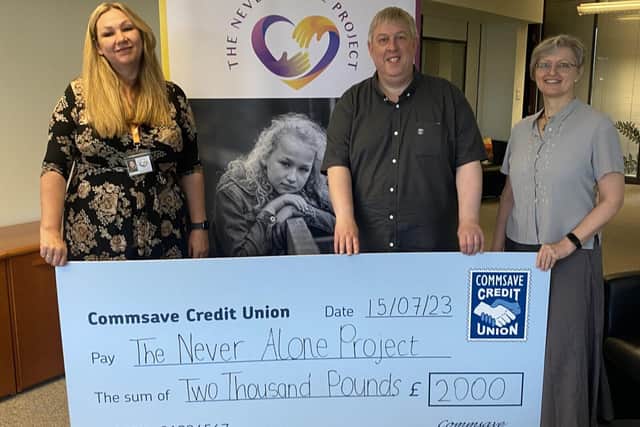 James Richards, Commsave, with Ilze Lee (left) and team at The Never Alone Project
