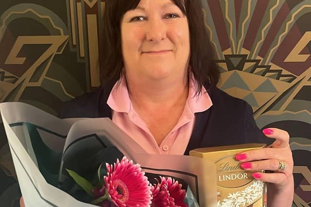 Julie receives gifts and recognition for the dedication to her role at Brampton View Care Home