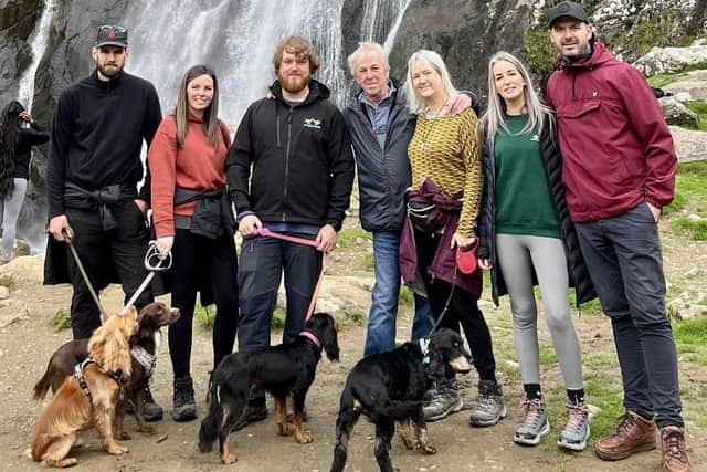 Alex with Trevor and his family/submitted