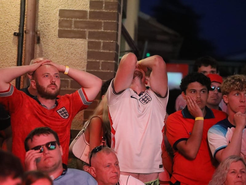 Fans at the Kettering Town FC World Cup Fan Zone watch England vs Argentina in the semi-final