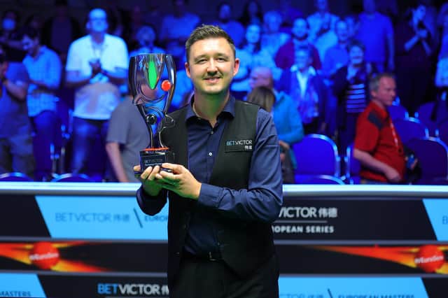 Kettering's Kyren Wilson shows off the trophy after he won the BetVictor European Masters in Germany at the weekend. Pictures courtesy of World Snooker Tour