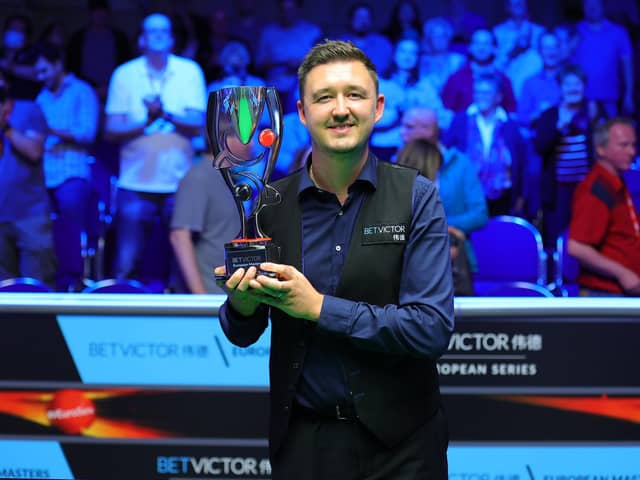 Kettering's Kyren Wilson shows off the trophy after he won the BetVictor European Masters in Germany at the weekend. Pictures courtesy of World Snooker Tour