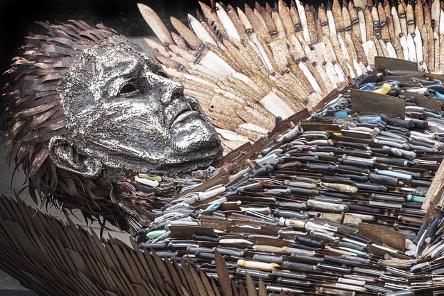 The statue is made from more than 100,000 weapons and blades seized by the England and Wales' 43 police forces