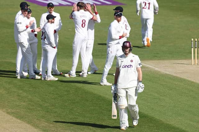 Calvin Harrison trudges off after being bowled for a seocnd ball duck (Photo by David Rogers/Getty Images)