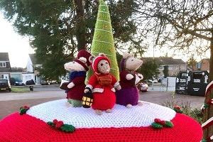 Rushden Yarn Bombers have decorated the town's post boxes with festive toppers