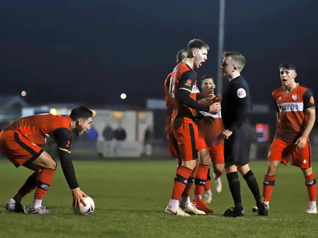 The Poppies players protest a decision that went against them during Tuesday's 0-0 draw with Farsley Celtic. Picture by Peter Short