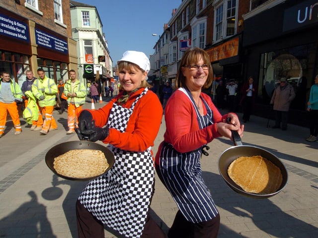 Wellingborough, shop workers and construction workers race through the newly-repaved Silver Street
George Allan shop team l-r Brenda Beck and Kathy Arnold March 2011