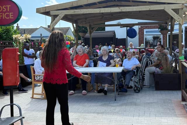 Our fabulous Talent Show winner, Maria J, wowing the crowd — with our judges and a packed garden soaking up every note. What a show!"