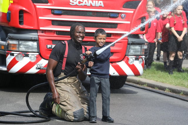 Firefighters showed the pupils how to aim a hose