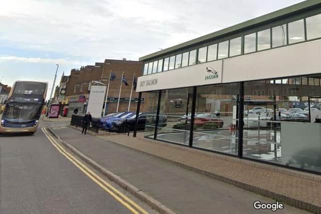 detectives are investigating an assault and robbery near the former Jaguar garage in Abington Square on Wednesday