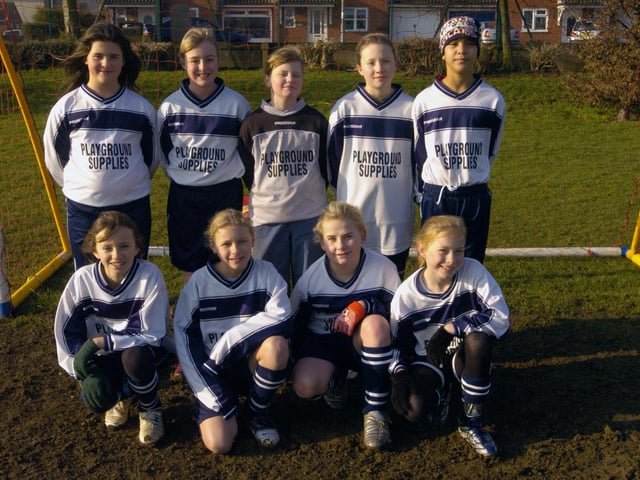 Kettering General under 11 girls football team. l-r  Faryl Smith, Emma Robinson, Kerryn Copeland,(corr)  and Rebecca Downing.
Back: Dominique Rosella, Stacey Essam, Kelsey Lythgoe, Abby Callaghan, and Mica Clayton. - January 2006