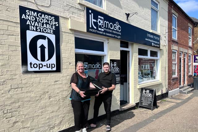 Jonathan Babb - IT Magic receiving donated laptops from Jo Taylor - TC Group