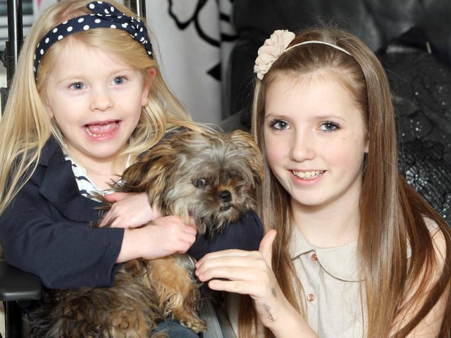 Kelsey Fordyce (13)  nominated for a Young Carer award.  with her sister Lexie (4) and their dog Karma