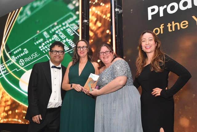Emma Armstrong (2nd Left) In2tec's Sustainable Electronics Ambassador proudly displays award