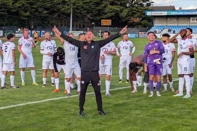 Elliot Sandy leads the celebrations after Diamonds' FA Cup win over Braintree (Picture: Shaun Frankham)